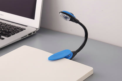 Clip-On LED Book Light in Blue – slim clip-on light for books and e-readers"